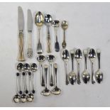 A set of six silver coffee spoons with individually decorated bowls, Sheffield 1994,
