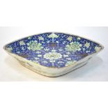 A Chinese blue ground dish decorated with bat,