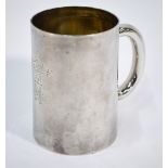 A Victorian plain silver pint mug of slightly tapering form with loop handle and glass base,