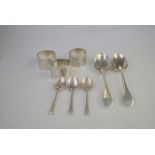 Two silver OEP dessert spoons, three napkin rings and three coffee spoons (8), 7.