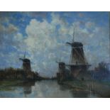 Johannes Gijsbert Vogel (Dutch, 1828-1915) - An extensive Dutch canal view with windmills,