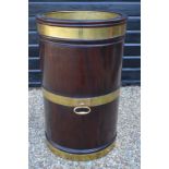 An unusual George III style oversize brass bound mahogany peat bucket,