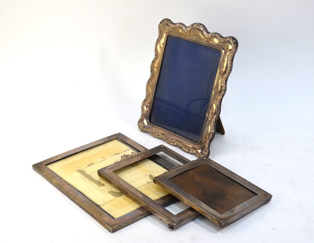 Four various silver-faced photograph frames - all as found
