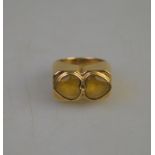 A yellow metal set with two heart shaped citrines, approx 9g all in,