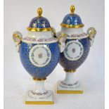 A pair of Kaiser, Germany early 19th century style porcelain ovoid vases and covers,