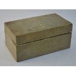 A shagreen cigarette box with silver hinges, London 1912,