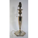 A large loaded silver table lamp in the form of a hexagonal baluster candlestick, Hawksworth,