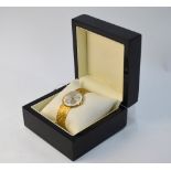 A gentleman's 18ct gold Ulysse Nardin wristwatch of slim profile,