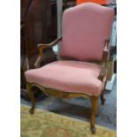 A pair of 18th century style walnut framed upholstered open armchairs,