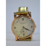 A gentleman's 14k Paul Buhre wristwatch with champagne dial (worn), on expanding gilt strap,