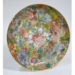 A famille rose dish of circular form,