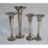 Four various trumpet-shaped vase-flutes with weighted bases - (all as found)