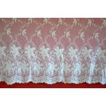 Three lengths of Edwardian cotton net curtains with Asiatic and flowering prunus design,