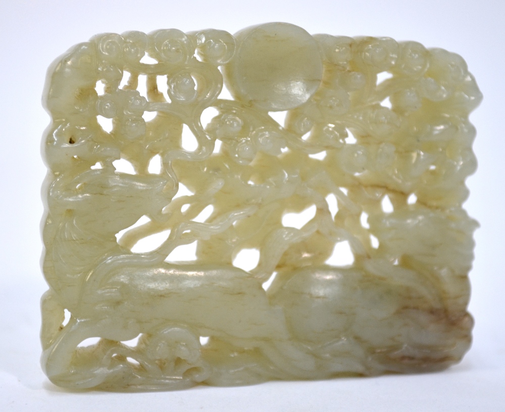 A green jade reticulated plaque of rectangular form decorated with two recumbent goats beside a - Image 3 of 5
