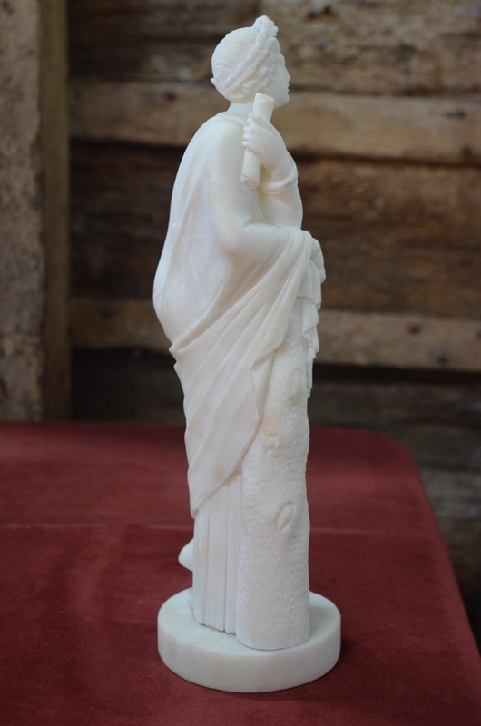 An alabaster cloaked classical figure with laurel wreath and scroll, - Image 5 of 5