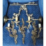 A pair of Rococo style twin-branch wall lights hung with facetted glass drops,