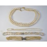 A four row simulated pearl bracelet,