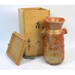A Japanese Shigaraki-yaki vase with irregular trumpet neck by Rakusai Takahashi; 25cm high;