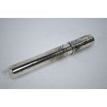 An Edwardian cylindrical silver cigar-case with star-pierced ventilation, John Wilmot,