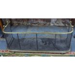 A Victorian brass and steel wire diamond pattern nursery fender with steel base plate,
