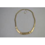 A 9ct yellow gold Cleopatra style fringe necklace,