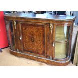 A Victorian figured walnut and yew gilt mounted credenza,