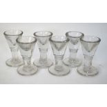 A set of eight 19th century penny lick glasses, 9.