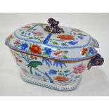 A 19th century stone china tureen and cover decorated in the Chinoiserie style with green parrots,