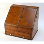 A Victorian oak slope front table top stationery/correspondence box with card index calendar