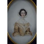 A Victorian watercolour portrait miniature on card of a lady in lace cap, unsigned, 12 x 8 cm,