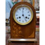 A French walnut dome cased mantel clock,