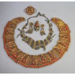 A large gilt metal collar style Indian necklace with coral and filigree decoration to/w a pair of