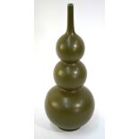 A teadust/Ch'a yeh mo style vase of triple gourd form; 45cm high;