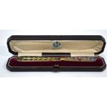 An Imperial Russian gilt metal and plique-a-jour enamel letter knife,