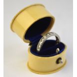 A diamond set full eternity ring, in white metal setting, having plain sides, size N,