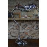 An Art Deco style electroplated desk-lamp with scalloped shades