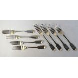 A set of eight Victorian silver fiddle pattern table forks, Chawner & Co.