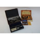 A good quality cased set of drawing instruments, including sectional 40" compass, unnamed,