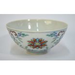 A doucai bowl decorated with a formal lotus design; 9.