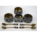 Four various small Russian 88 zol, gilt and plique a jour enamel open salts with spoons,