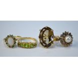 Four 9ct rings including oval claw set smoky quartz, size O, a single cultured pearl, size N 1/2,