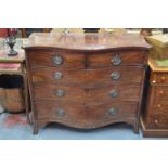 A George III mahogany serpentine chest of two short over three long graduated drawers,