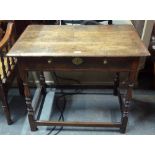 A late 17th/18th century oak side table,