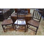 A set of three 18th/19th country fruitwood side chairs each having a shaped single piece pollard