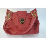 An Aspinal of London red leather handbag with gilded chain and padlock detail Condition