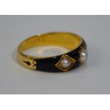 A black enamel and half pearl mourning ring, 18ct yellow gold, Chester, engraved 1893 etc,