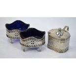 A pair of oval pierced open salts (one bearing rubbed hallmarks), to/w an octagonal mustard,