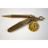 A 9ct cased yellow gold reeded penknife to/w 9ct engine turned propelling pencil and 9ct St