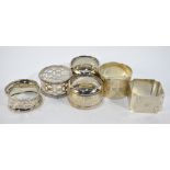 Six various silver napkin rings, 4.