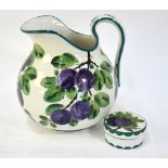 A Wemyss large ewer, 25 cm high and a Wemyss cosmetic box and cover of circular form, 9 cm diam.